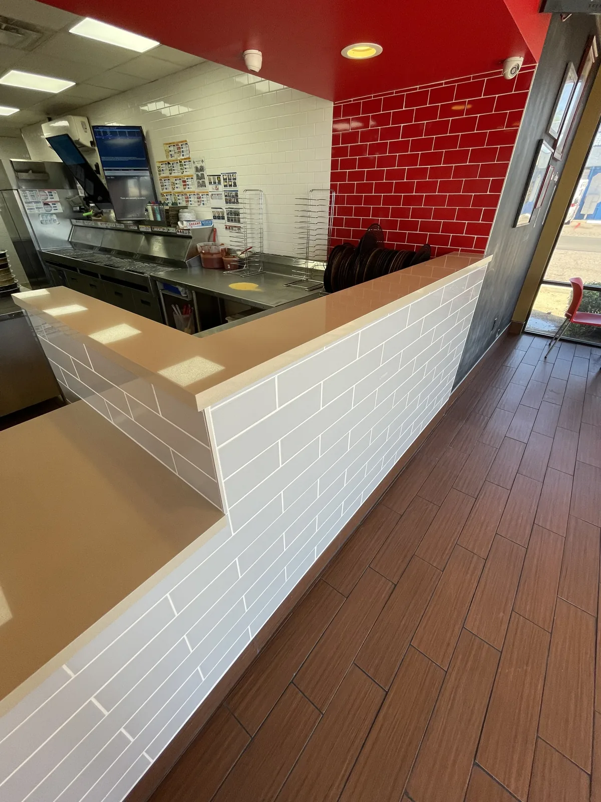 Tiled service counter build-out in a commercial retail space