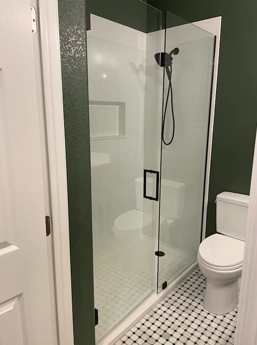 Finished walk-in glass shower and bathroom remodel by Orange Cactus Remodeling, serving Gilbert, AZ