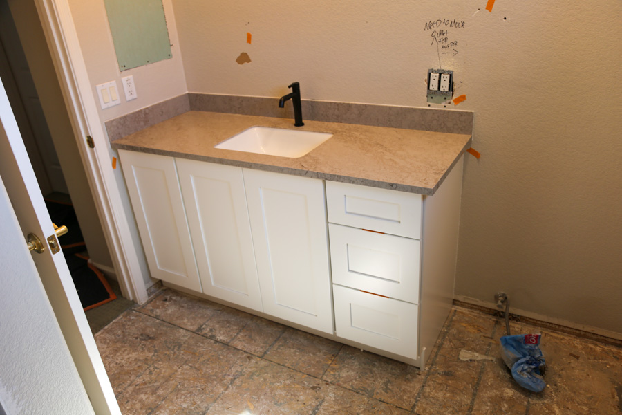 White shaker cabinetry with a quartz countertop and undermount sink by Orange Cactus Remodeling, serving Scottsdale, AZ