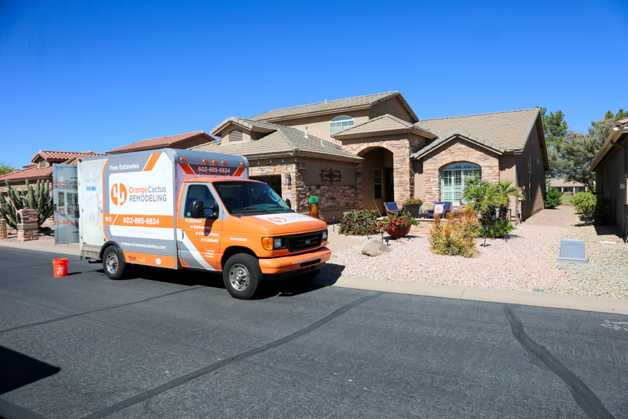 Orange Cactus Remodeling truck outside a single-family home during a whole-home remodel — serving Mesa, AZ