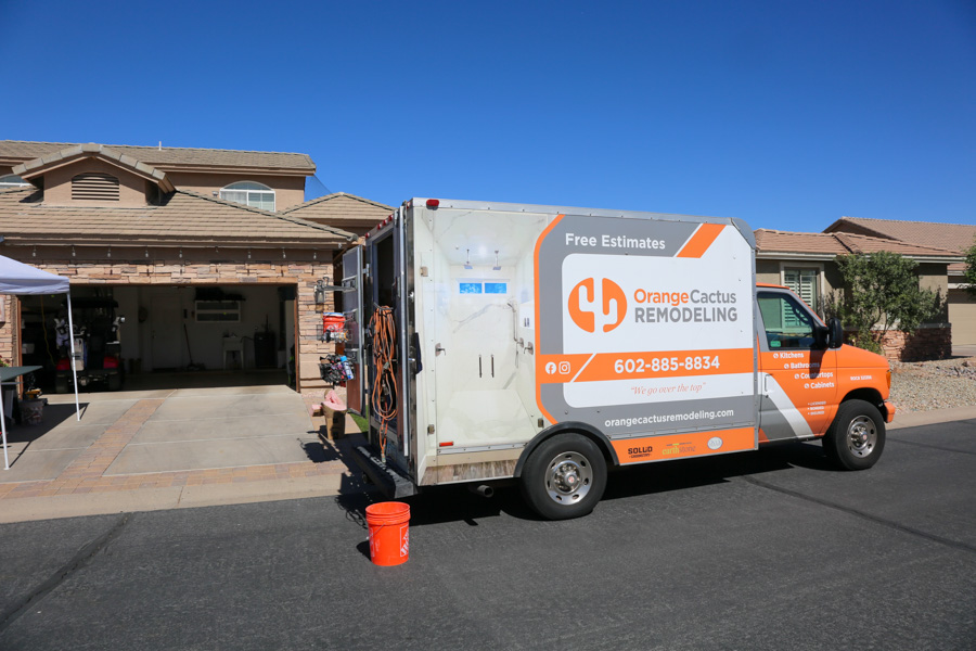 Orange Cactus Remodeling's fully equipped work trailer parked outside a home, serving Tempe, AZ