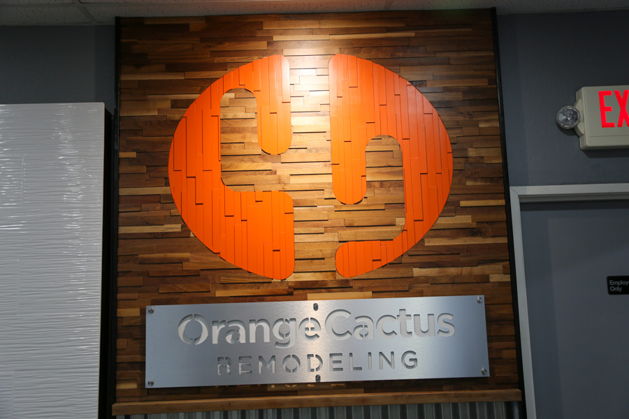 Orange Cactus Remodeling team member working on a kitchen install